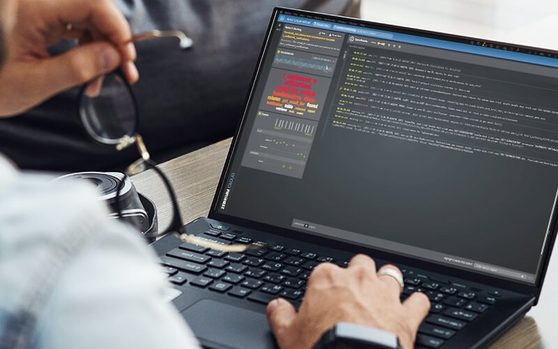 Person using a laptop at work