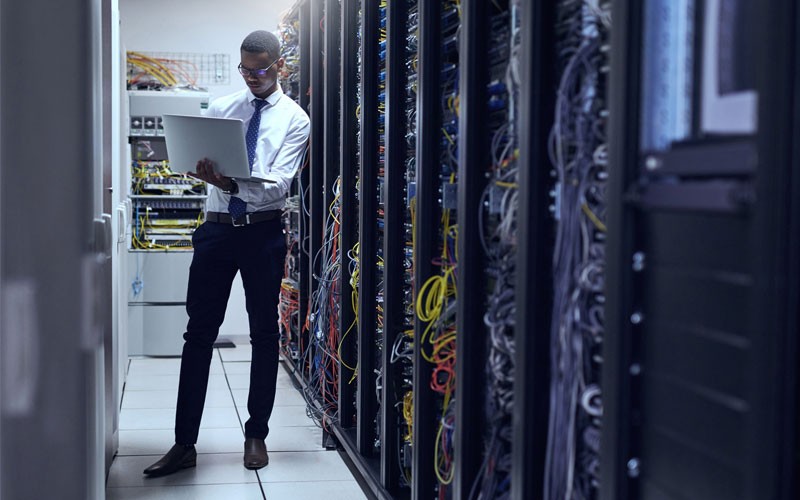 Man working in server room