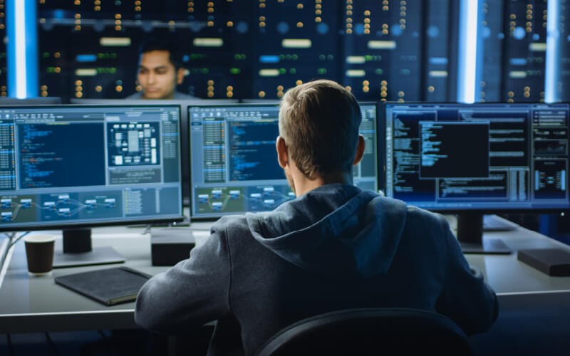 Man coding at the office