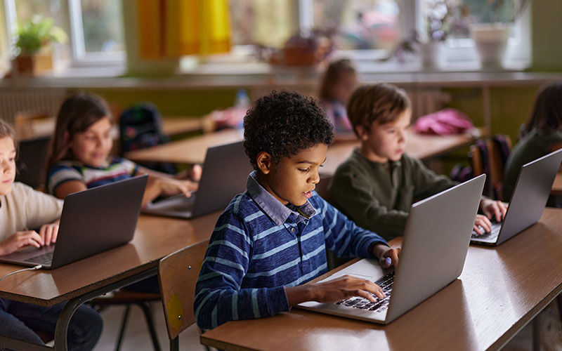 Threatdown Mobile Security for Chromebooks Classroom working on laptops
