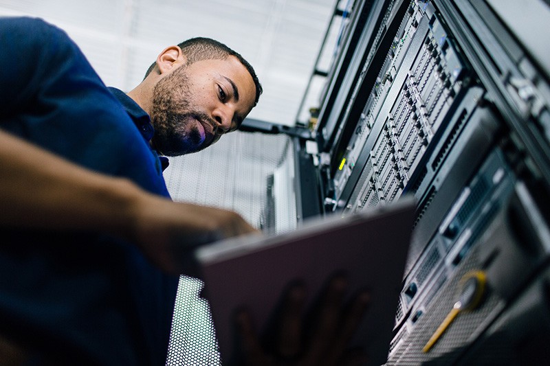 IT admin using Trend Micro security software to check vulnerabilities of servers in data center