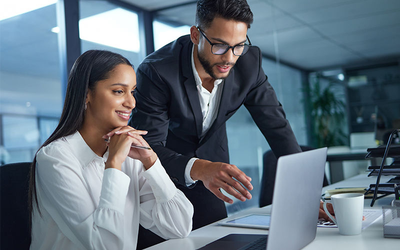 Teammates working together at the office