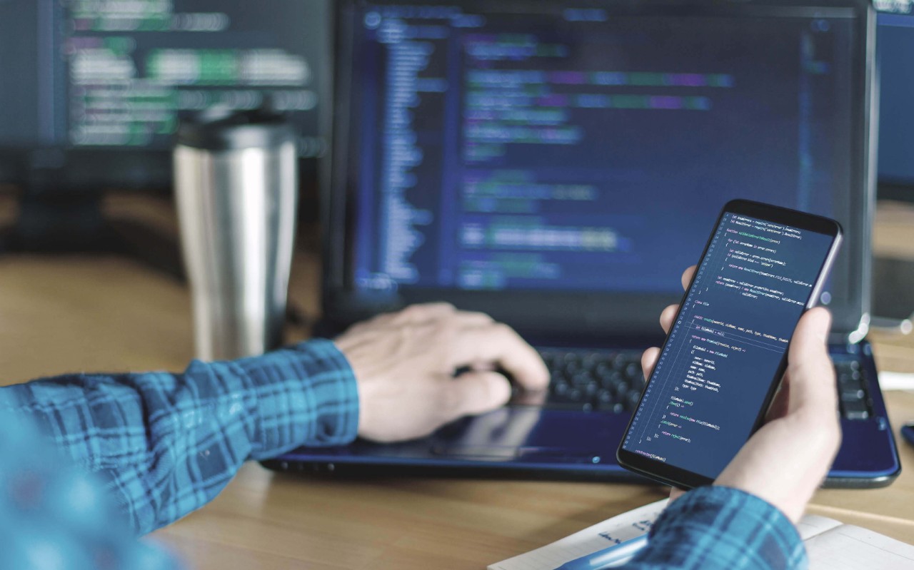 Man working using a laptop