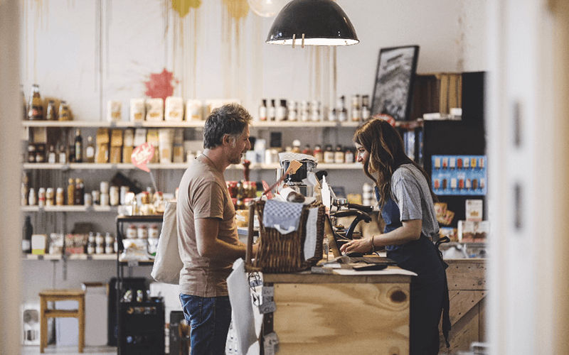 Customer handing their payment