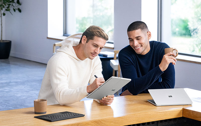 two-users-microsoft-surface-devices