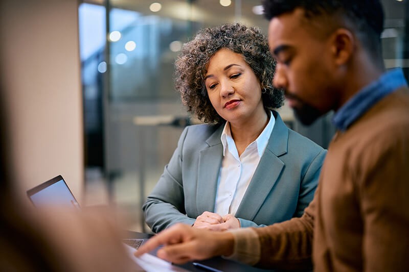 Woman working in store with tech